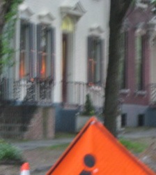 Orange glow in the windows of 21 Washington Av - 30June09