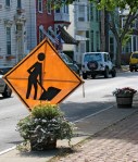 Orange Work in Progress Sign – in front of the Riverside Condo on Front&nbsp;St.
