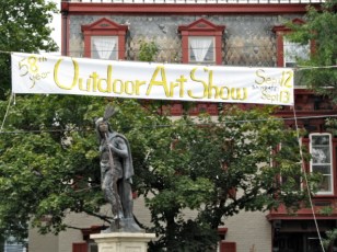 Lawrence the Indian under the banner of the Stockade's 58th Outdoor Art Show - 12Sep09