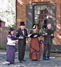 Walkabout 2009 - strolling singers stop at the Teller House, 121 Front St.