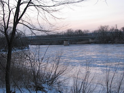 subtle sunset hues on the icy Mohawk River seen from the end of Cucumber Alley in Schenectady - 18Dec09