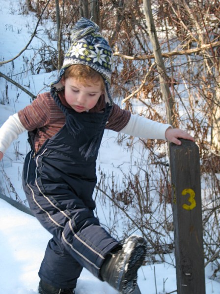 Devin at marker 3 on the Woodlot Trail of Five Rivers Center - 16Jan2010