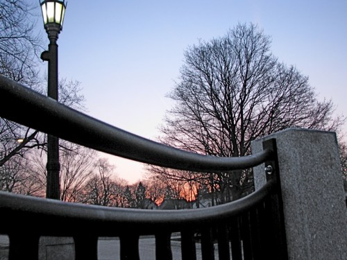 sunrise seen through the esplanade railing in Riverside Park along the Mohawk River - Schenectady NY - 19March2010