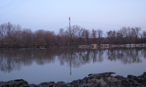 Scotia bank of the Mohawk River at sunrise seen from near the Riverside Park children's playground - 19March2010