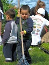 Tianning helps with a rake on Planting Day at Riverside Park in Schenectady NY - 15MAY2010