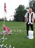the Lamars put golf balls back into buckets at the FCSS Golf Ball drop - 18Jun2010