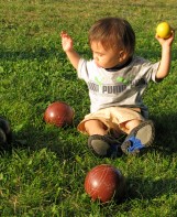 Andrew encounters his first set of bocci balls - Riverside Park - Schenectady NY - 21July2010