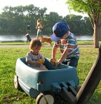 Devin inspects the wagon with Andrew in it – Riverside Park –&nbsp;21Jul2010