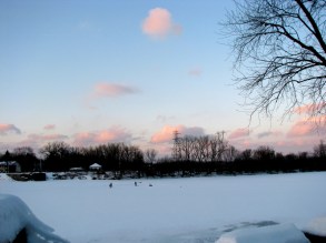 ice fishers at sunset on the Mohawk River seen from the deadend of Washington Ave. in the Schenectady NY Stockade - 30Jan2011