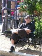 Papa Acevedo relaxing across from his son Alec's exhibit - 60th Annual Stockade Villagers' Outdoor Art Show - 10Sep2011
