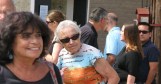 Nancy Denofio and others watch the award ceremony - 60th Annual Stockade Villagers' Outdoor Art Show - 10Sep2011