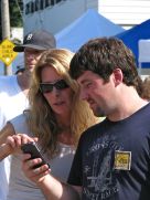 artists Nancy Magnell and Eric Laffer check out a photo during the award ceremony - 60th Annual Stockade Villagers' Outdoor Art Show - 10Sep2011