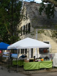 Carol Schilansky's exhibit during set-up in front of 29 Front St. - 60th Annual Stockade Villagers' Outdoor Art Show - Schenectady NY - 10Sep2011